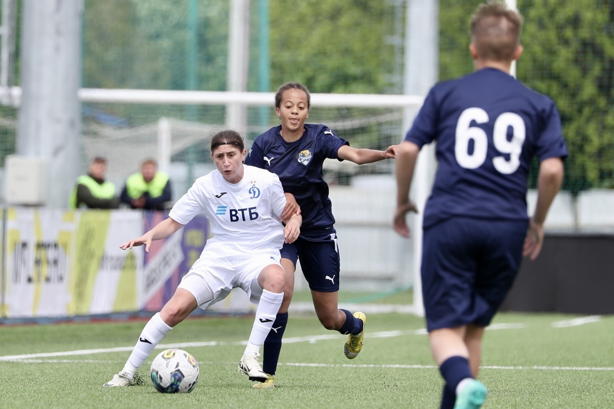 Dynamo midfielder Lamunat Mustafaeva against former Blue and White football player Annabelle Kipasa Maniki